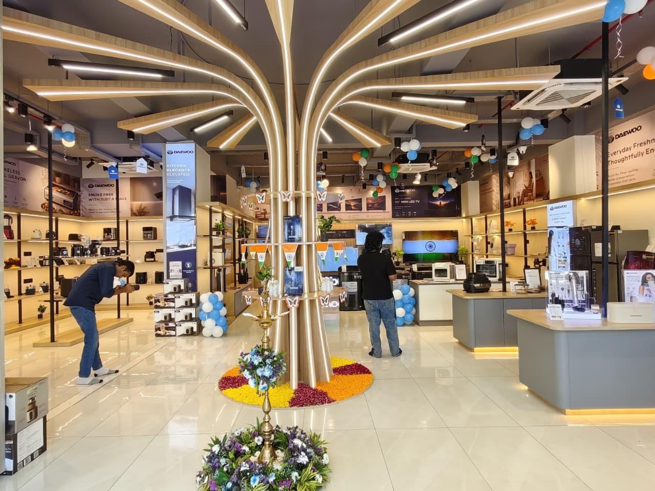 Daewoo appliance showroom interior with displays and signature lighting